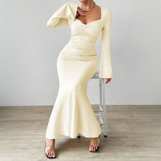 A sophisticated, ankle-length dress with a mature, elegant style