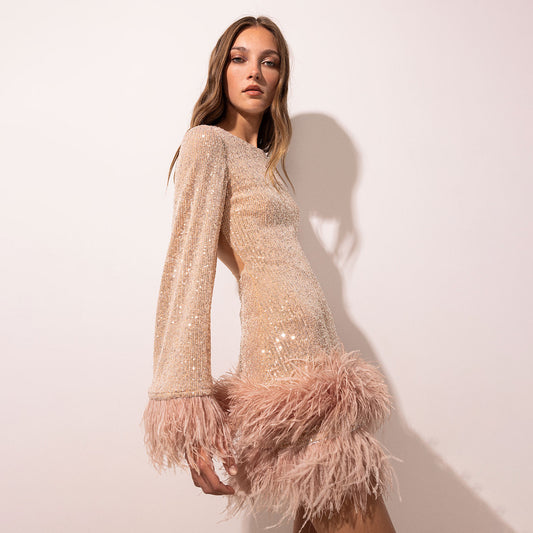 Women's waist-cinching short dress with plunging back, long sleeves, sequins and feathers